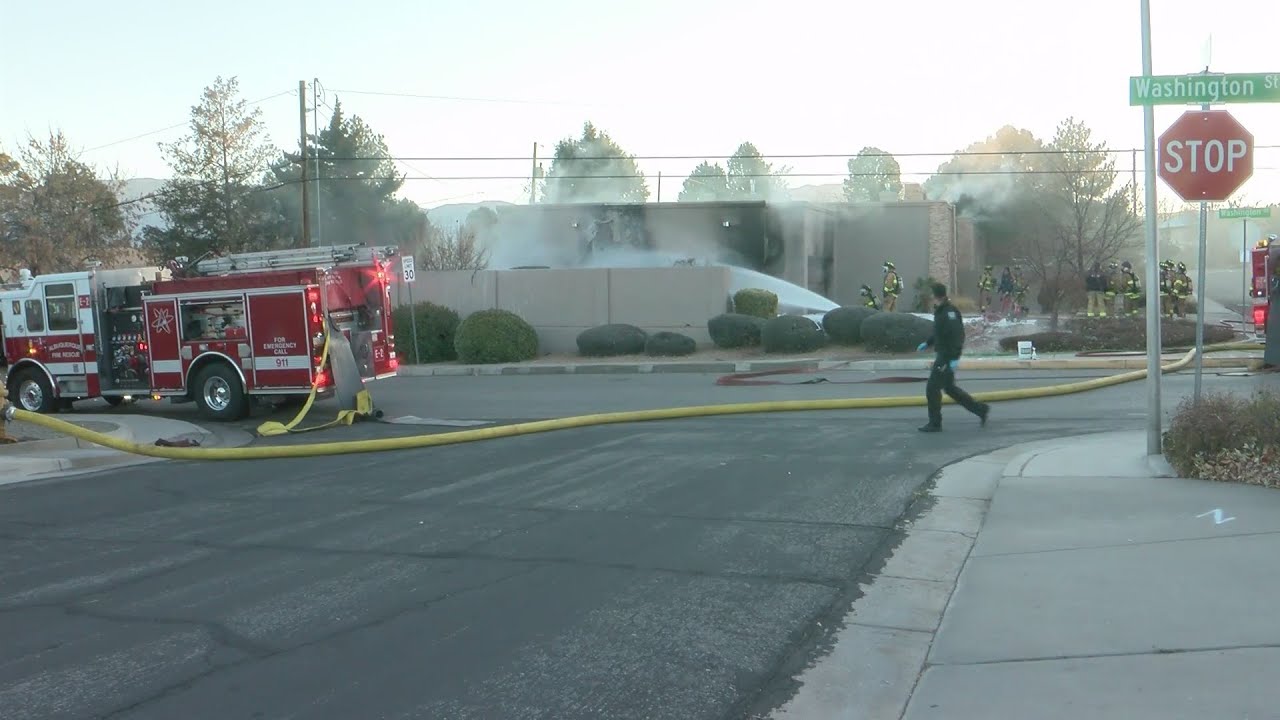 House catches fire after car crashes into it - YouTube