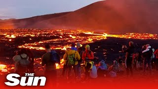 People gather to watch epic Icelandic volcano eruption fire show