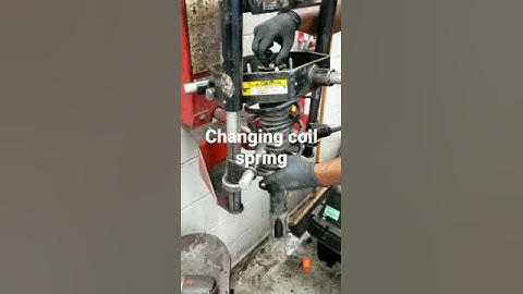 Removing coil spring