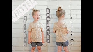 :   .   . Children's knitted blouse.