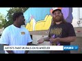 Artists paint commissioned murals on 18-wheeler in Mississippi