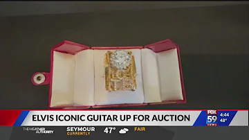 Elvis guitar up for auction