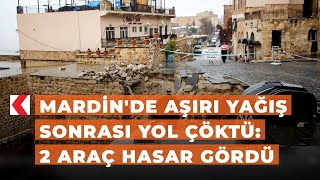 Mardin'de aşırı yağış sonrası yol çöktü: 2 araç hasar gördü