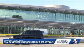 XNA travellers managing flight reductions