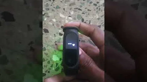 Como destravar pulseira mi Band 2?