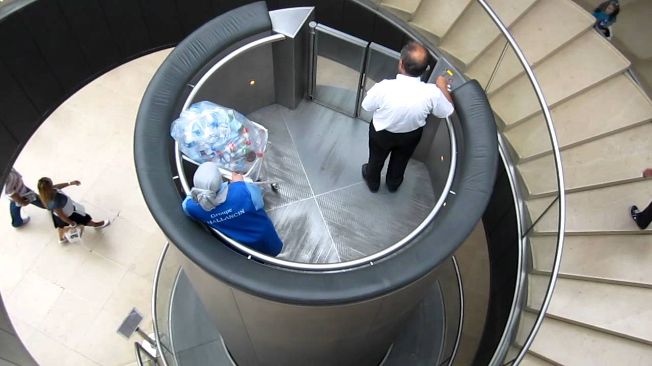 The elevator of the louvre YouTube