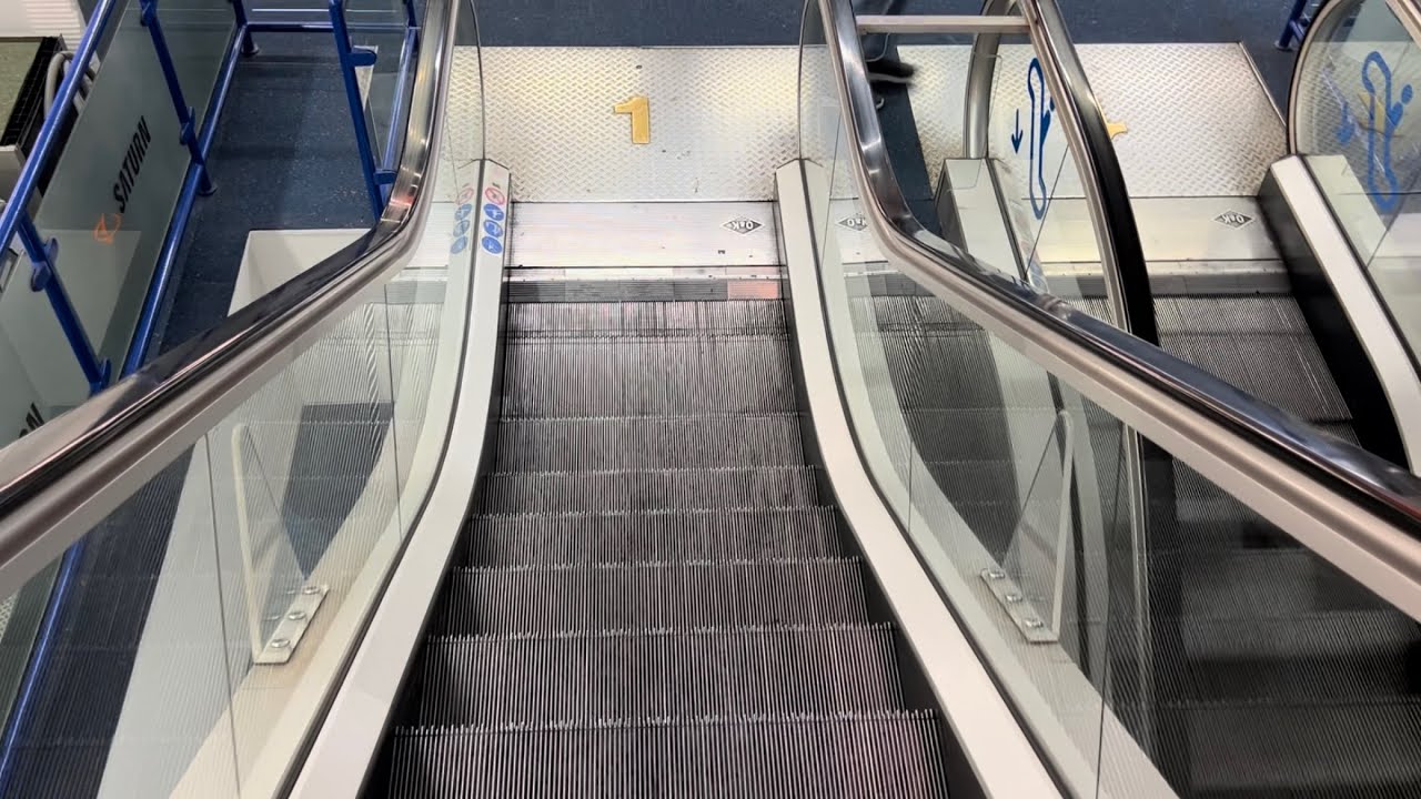 Nurnberg, Germany. 4x O&K Escalator ride at a Saturn Store in the City Centre. Original 1990 RTK-B