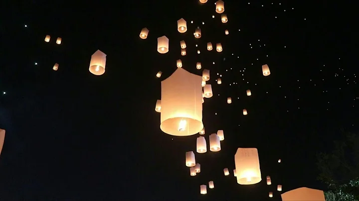 Sky glitters as lanterns released at Thai festival | AFP - DayDayNews