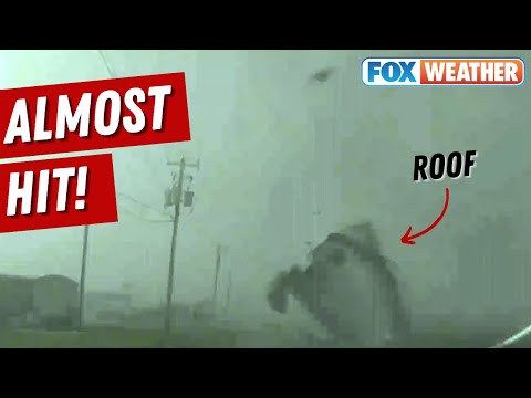 CAUGHT ON CAMERA! Roof Torn Off Building Just Misses Storm Chaser