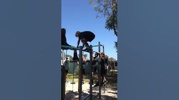 Back flip off monkey bars