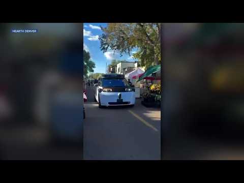 Waymo caught on video driving through South Pearl Farmer's Market during setup