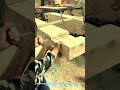 Skilled Carpenters Hand Sawing Traditional Mortise and Tenon Joint