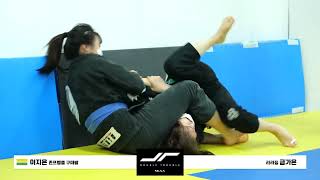 Girl submits guy with a headscissor - BJJ match