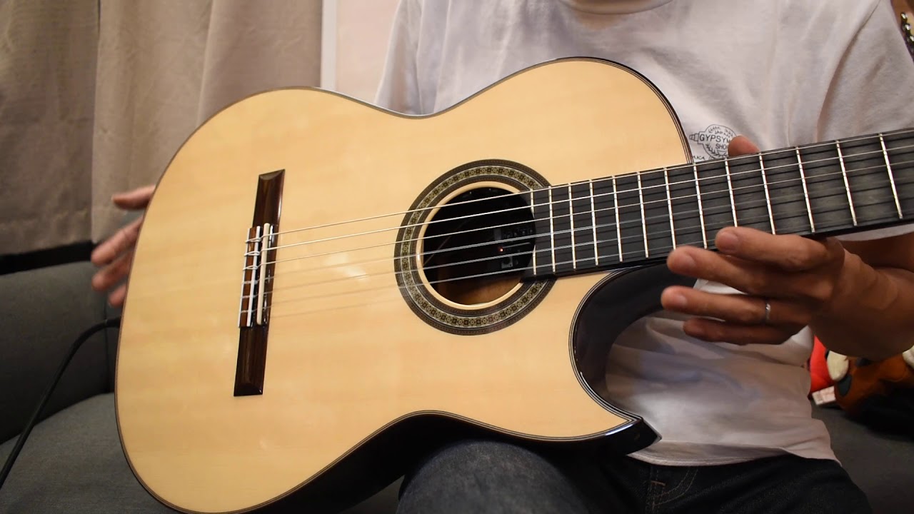 Comparing two ASTURIAS electro-acoustic guitars