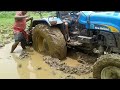 New Holland "Tractor TT55 pudding with Rotavator