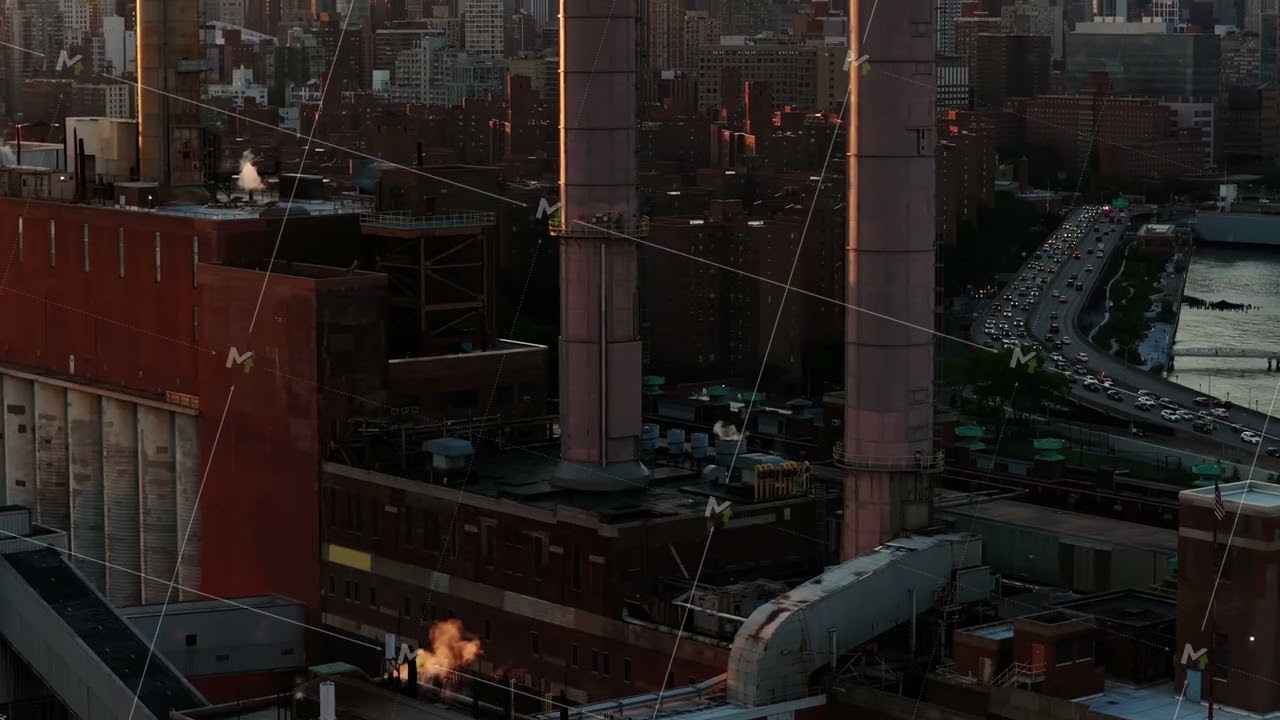 Aerial View of Industrial New York City at Sunset, Featuring the Hudson River and Empire State