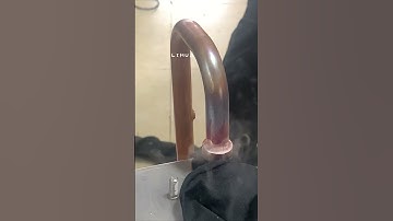 Handheld induction brazing of heat exchanger