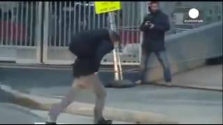 People walking through heavy wind in Norway.