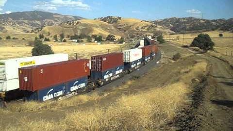 BNSF Northbound van / stack passes Southbound stacktrain in the hole @ Bealville, CA  9/7/2012