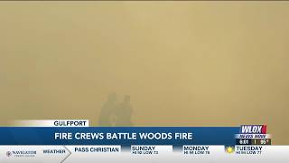 Gulfport Fire Department, Mississippi Forestry fighting fast-moving woods fire near Gulfport neig...