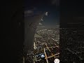 Aeroplane moving upon new york city in night Mode