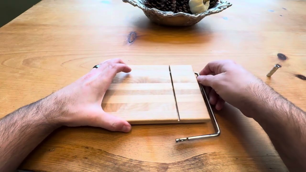 Cheese slicer assembly, wire replacement.