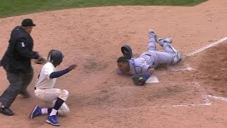 KC@CHC: Fowler out at the plate after review in 11th