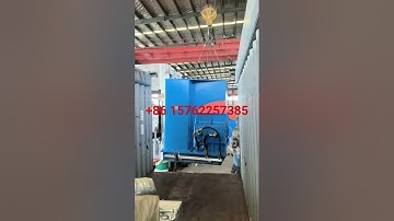 Loading the 110L rubber kneader with top open container