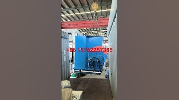 Loading the 110L rubber kneader with top open container