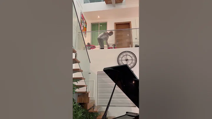 Kiss Daniel playing With his twins boys