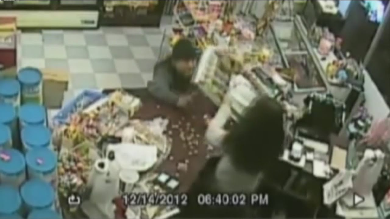 Clerk with gun stops knife-wielding robber