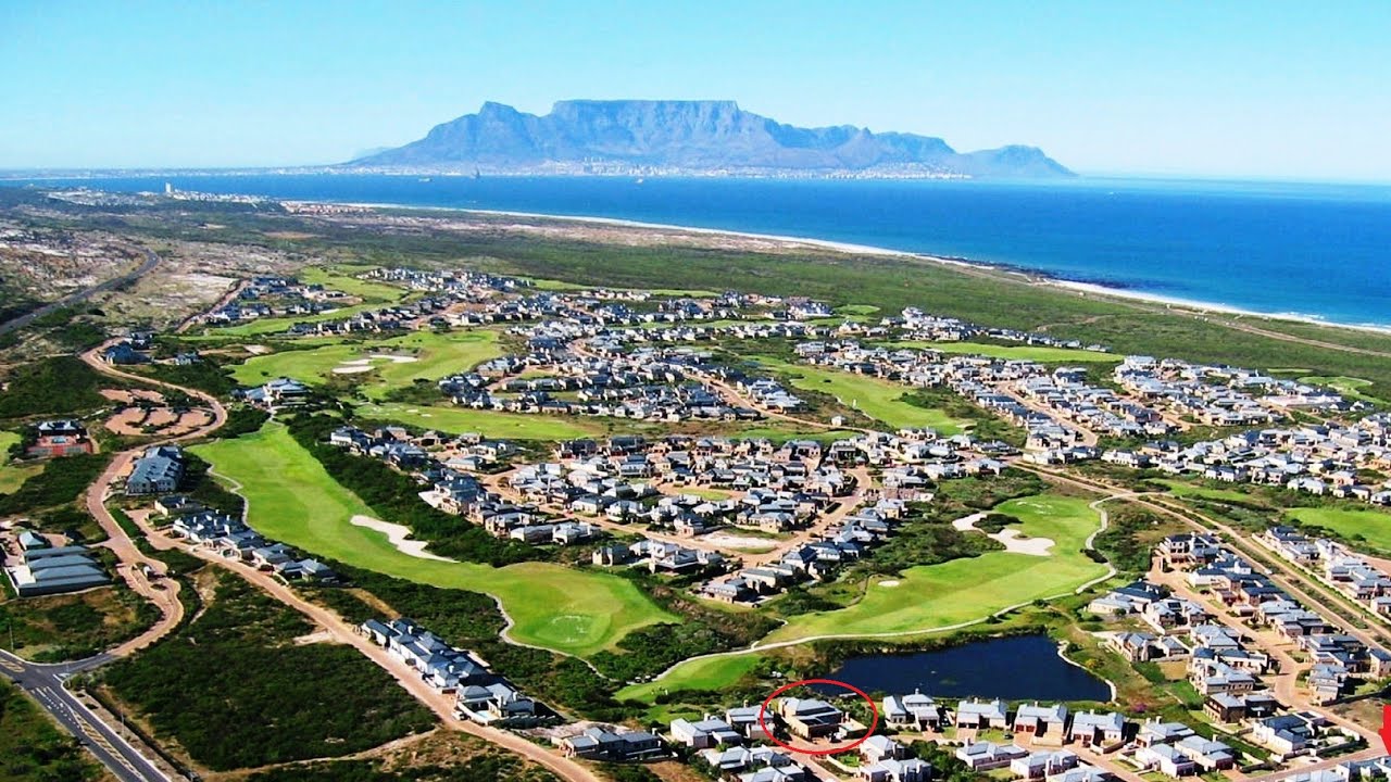 Unmatched tranquility & secure living on Atlantic Beach Estate, top golf & lifestyle in Cape Town.
