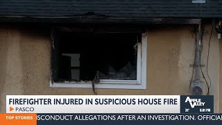 Firefighter hurt in "suspicious" house fire Wednesday