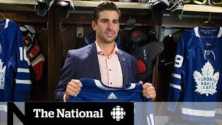 NHL star John Tavares signs with Toronto Maple Leafs