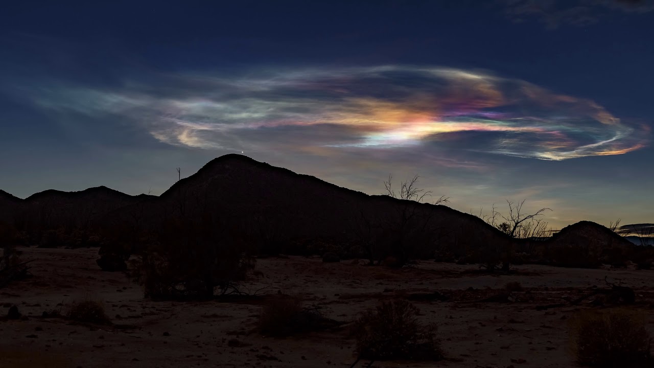 Very short time lapse of rainbow colored clouds caused by a Navy missile launch - YouTube