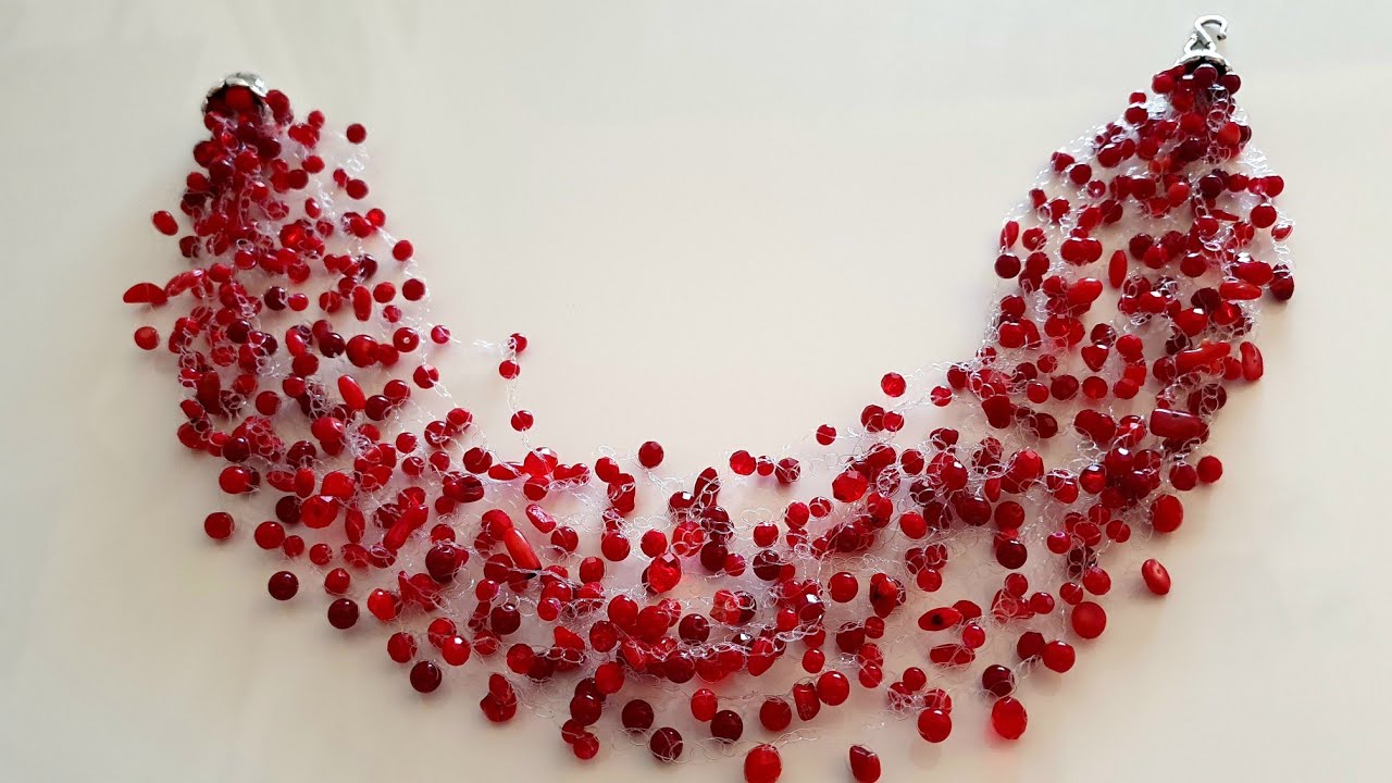 Collana trasparente  con coralli e swarovski.