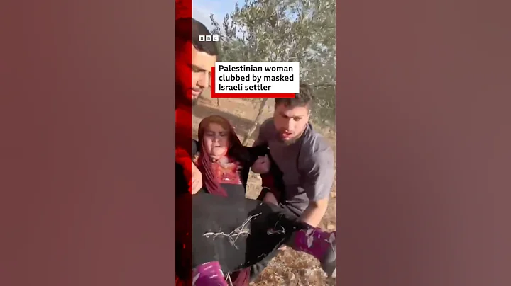 Palestinian woman clubbed by masked Israeli settler. #BBCNews