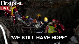 WATCH: Rescuers Race Against Time to Save Dozens Stuck Inside George's Collapsed Building