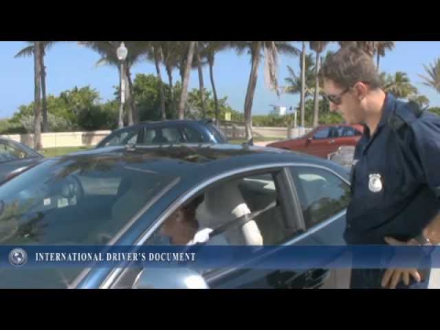 Police Officer pulls over driver with the International Driver's License. class=