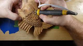 Wood carving a spirit fish, dremel,whittling