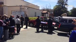 Alameda County Sheriff's deputies carry Khin's coffin inside the De Young funeral home on May 17, 20