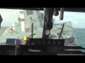 Lynx helicopter landing on ship in rough sea