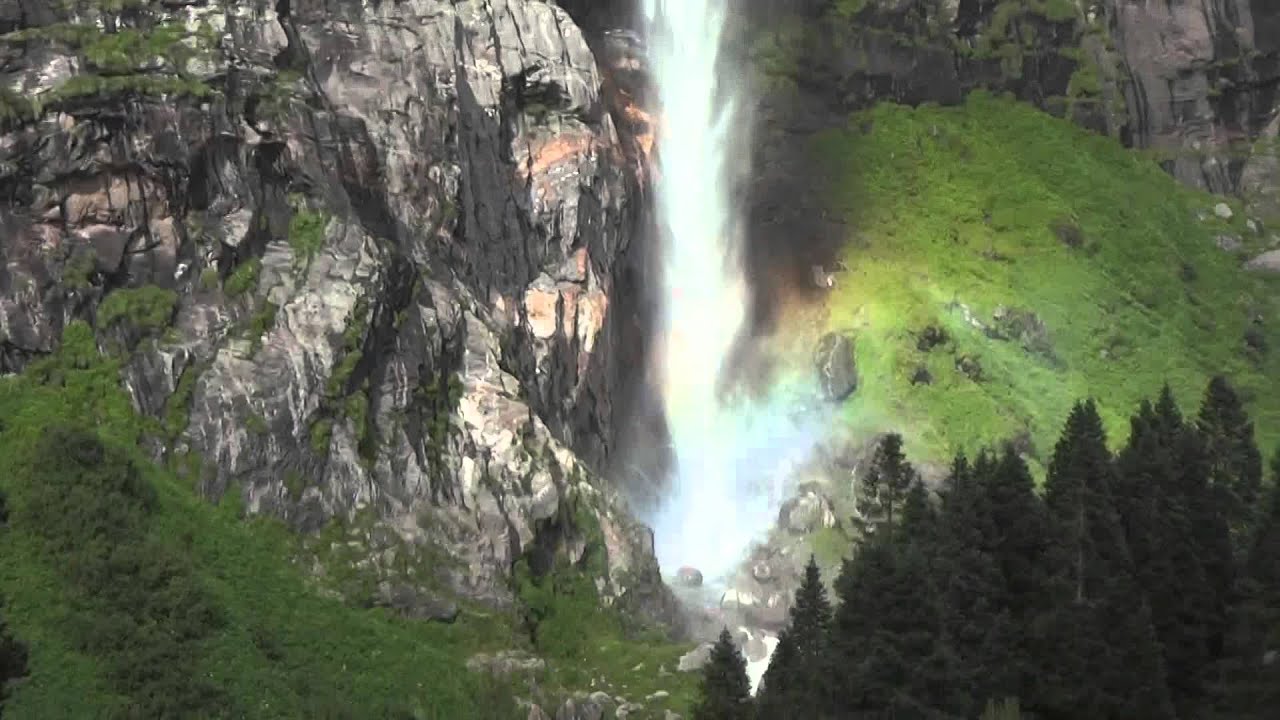 Amazing Rainbow waterfalls! Watch closely. Breathtaking. - YouTube