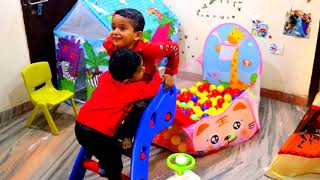 Behrouz and Jaani pretend to play indoor