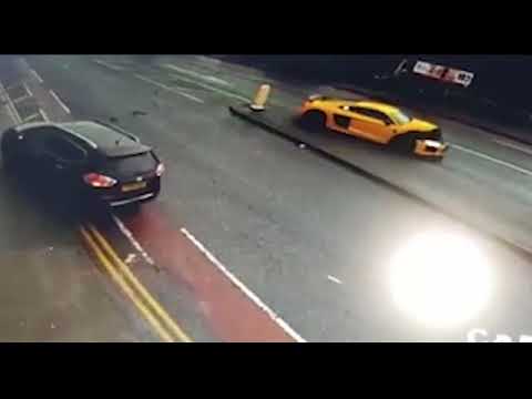 Unbelievable moment car almost flipped over by crashing Audi