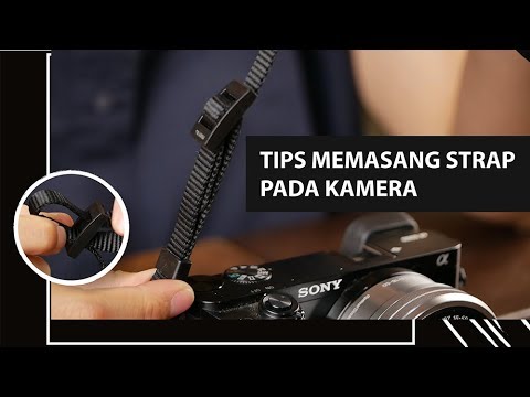 Video: Cara Memasang Tali Pada Kamera