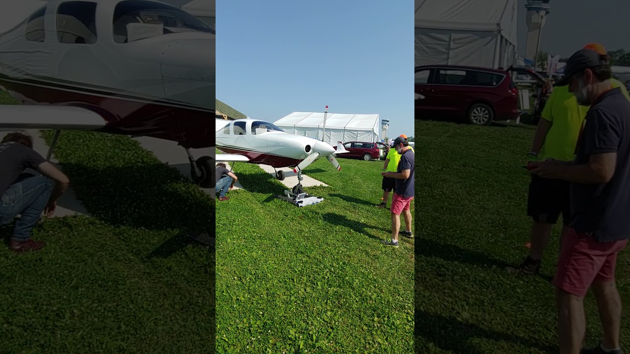 AC Technology Tug at OSH 2021 helping another vender.