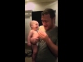 Dad uses pacifier to make baby erupt in a hysterical fit of giggles