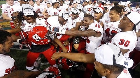 Watch as the NC State Wolfpack celebrate their victory in the Bitcoin Bowl