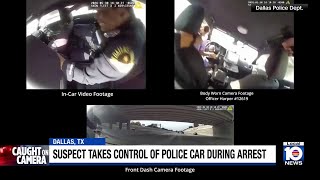 Suspect takes control of police car during arrest